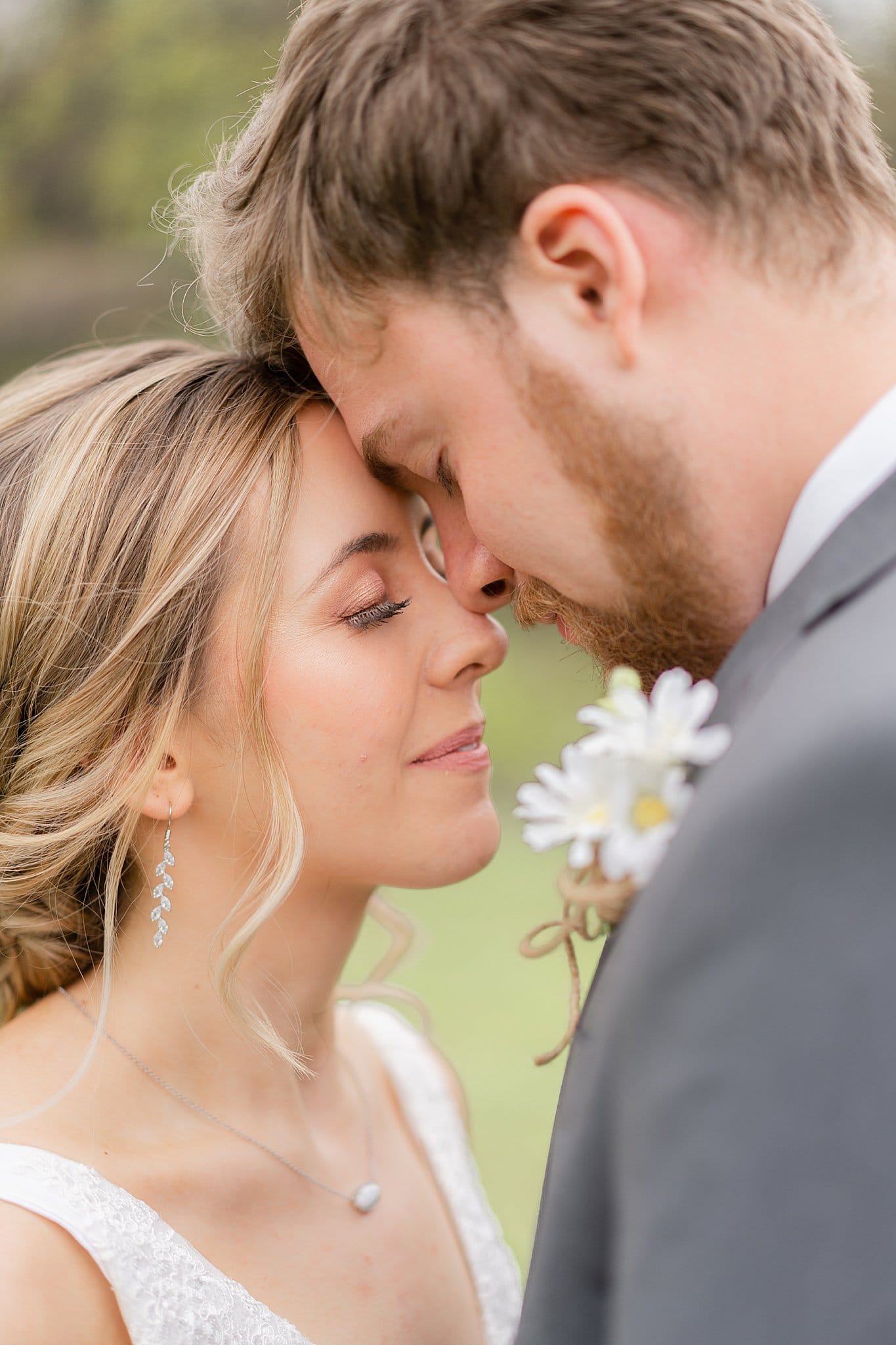 Bride and Groom touching foreheads